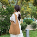 Bohemian Dream: Wavy Openwork Straw Tote Bag with Brown Leather Handles