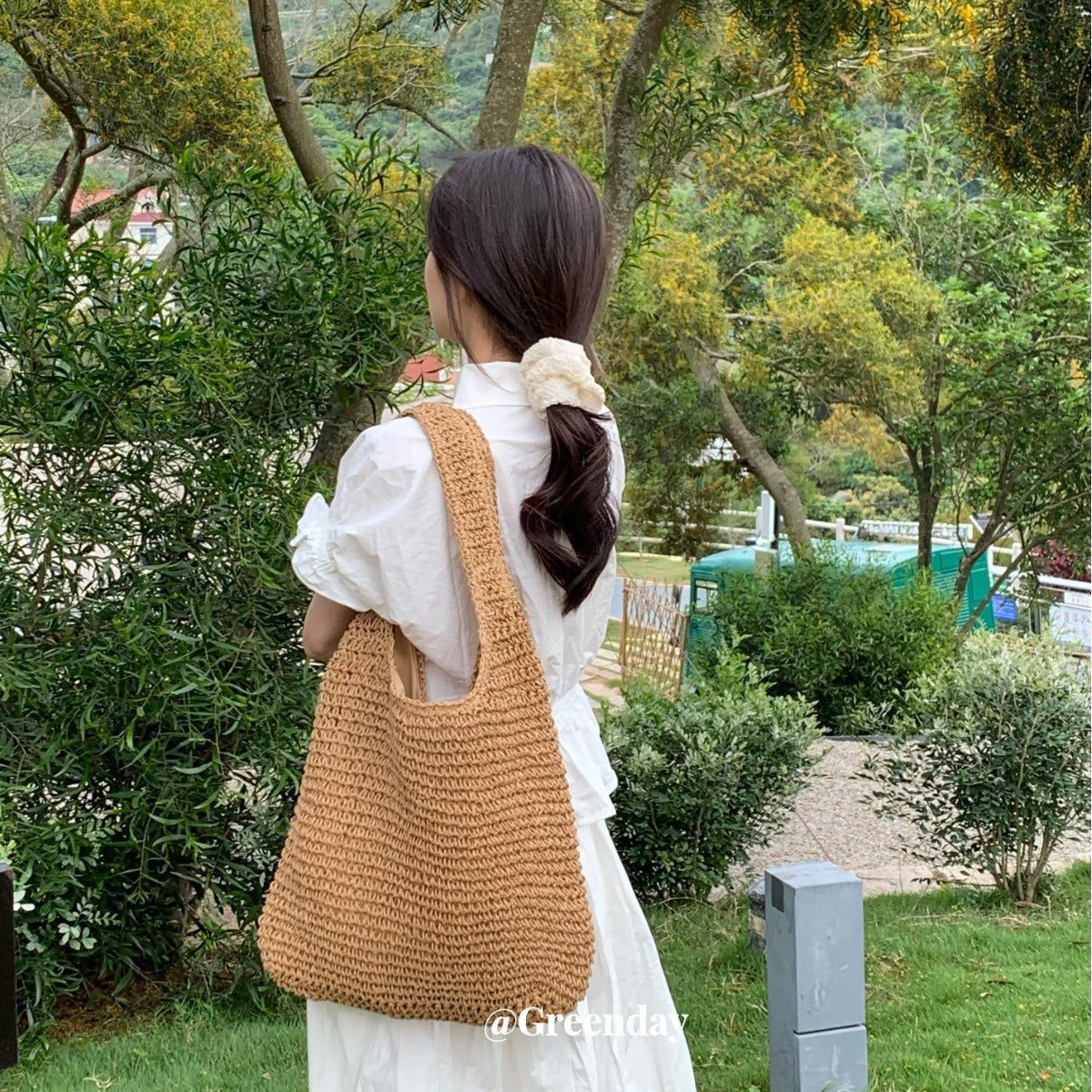 Bohemian Dream: Wavy Openwork Straw Tote Bag with Brown Leather Handles