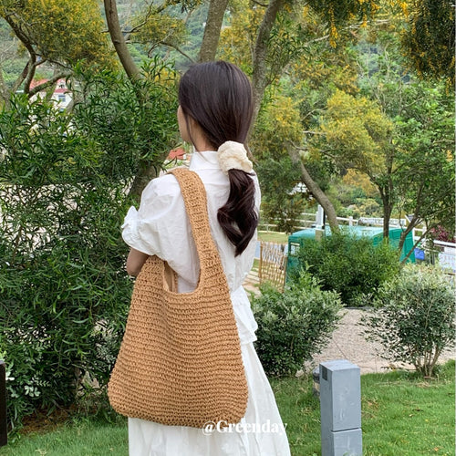 Bohemian Dream: Wavy Openwork Straw Tote Bag with Brown Leather Handles